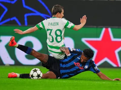 23 October 2024, Italy, Milan: Atalanta's Ederson and Celtic's Daizen Maeda battle for the ball during the UEFA Champions League soccer match between Atalanta BC and Celtic FC at Gewiss Stadium. Photo: Spada/LaPresse via ZUMA Press/dpa - IMPORTANT NOTICE: DFL and DFB regulations prohibit any use of photographs as image sequences and/or quasi-video.