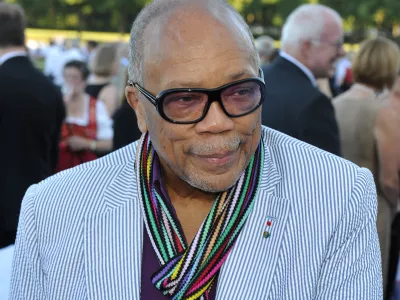 FILED - 21 July 2015, Bavaria, Munich: US-American jazz trumpeter and music producer Quincy Jones stands at the summer reception of the Bavarian State Parliament at Schleissheim Palace. Jones died on Sunday evening at his home in Bel Air in Los Angeles surrounded by his family, his spokesperson announced. Photo: Ursula D&uuml;ren/dpa