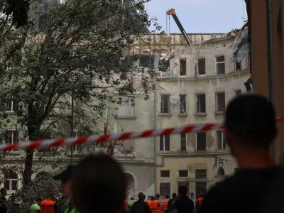 Rescuers work at a site of a residential building hit by a Russian missile strike, amid Russia's attack on Ukraine, in Lviv, Ukraine July 6, 2023. REUTERS/Roman Baluk