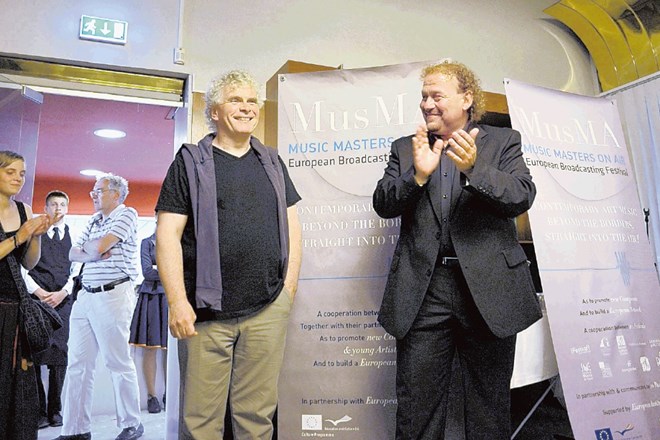 Sir Simon Rattle ob direktorju Festivala Ljubljana  Darku Brleku, ki je na letošnjem jubilejnem festivalu Dunajskim...