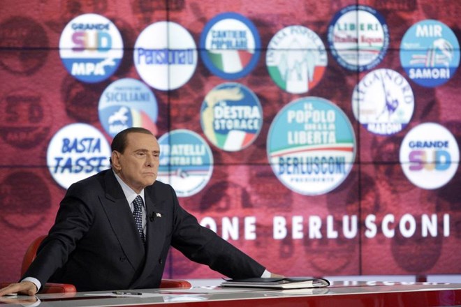 Poraženi Berlusconi. Foto: REUTERS  