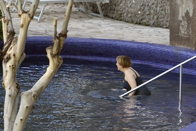 Foto: Merklova je na počitnicah v Italiji pokazala svojo mehkejšo plat