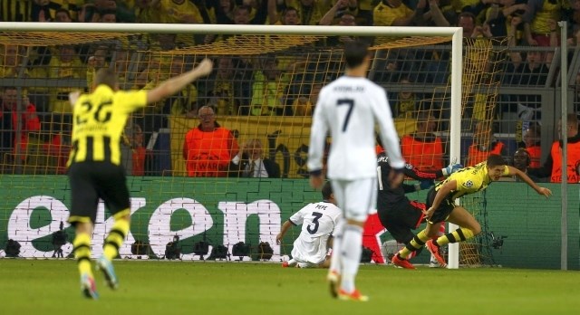 Lewandowski je že v 8. minuti poskrbel za evforijo na tribunah v Dortmundu. (Foto: Reuters) 
