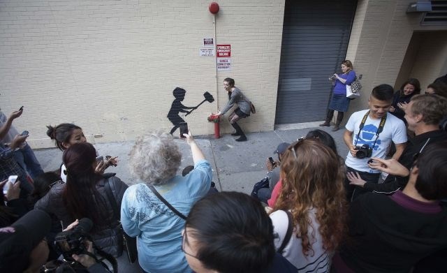 Newyorška policija Banksyja lovi, prebivalci nad grafiti navdušeni (foto)
