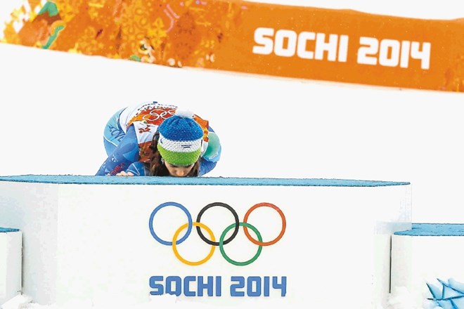 Alpska smučarka Tina Maze: dve zlati olimpijski kolajni za zmagi v smuku in veleslalomu. 
