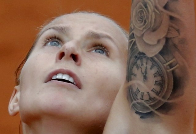 Hercogova je precej pozornosti fotografov pritegnila tudi s svojimi tatuji. (Foto: Reuters) 