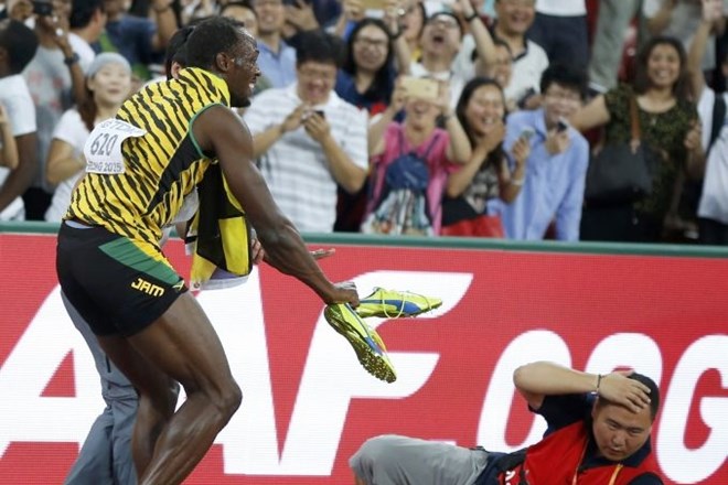 Usain Bolt z novim zlatim odličjem v zgodovino kraljice športa (video)