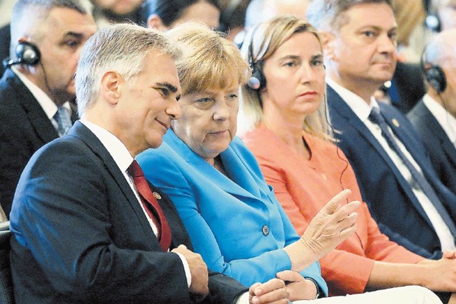 Nemška kanclerka Angela Merkel z gostiteljem, avstrijskim kanclerjem Wernerjem Faymannom 