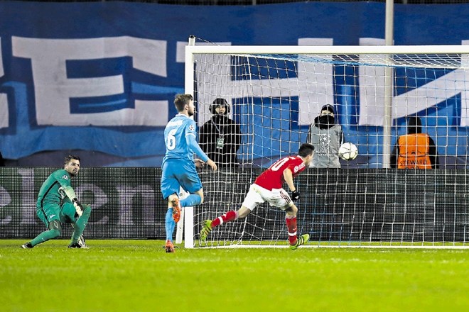 Nicolas Gaitan je z golom v 85. minuti za izenačenje na 1:1 priigral Benfici napredovanje v četrtfinale lige prvakov.