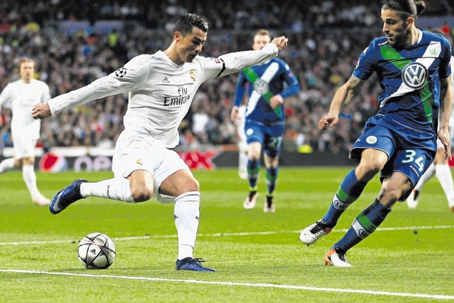 Zvezdnik Reala Cristiano Ronaldo  je dosegel tri gole proti Wolfsburgu.