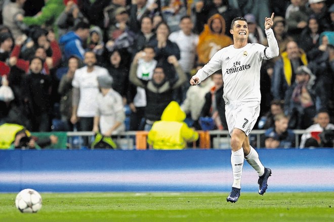 Zvezdnik Reala Cristiano Ronaldo  je dosegel tri gole proti Wolfsburgu.