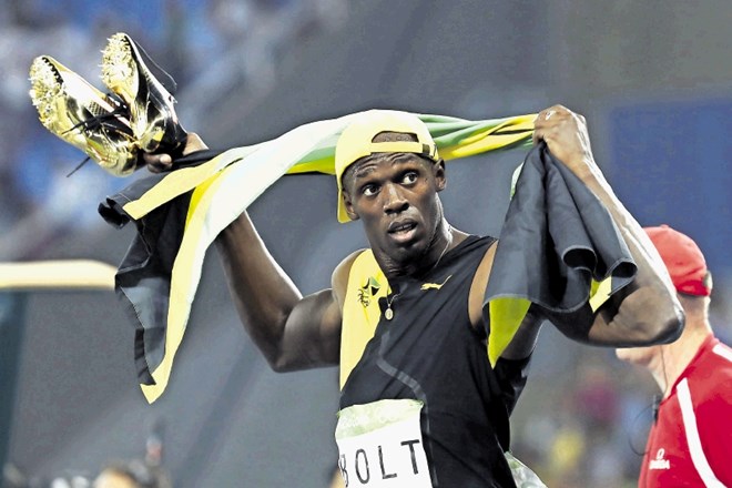 Ob zmagoslavnih trenutkih ob 29-letnem Usainu Boltu niso žena in otroci, temveč mama.