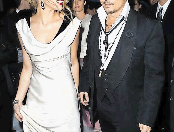 Johnny Depp in  Amber Heard sta poskrbela za drugo najbolj umazano ločitev leta.