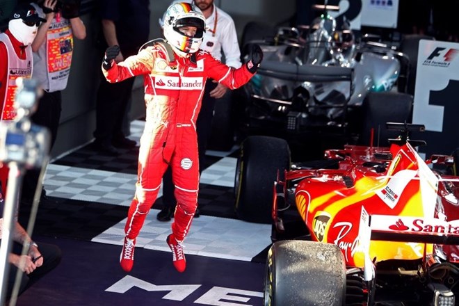 Sebastian Vettel se je v Melbournu razveselil svoje prve zmage  po VN Singapurja leta 2015. (Foto: Reuters)