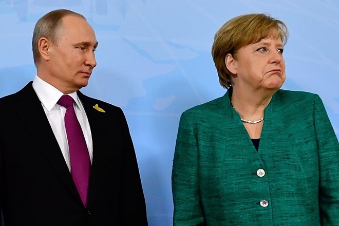 Ruski predsednik Vladimir Putin in nemška kanclerka Angela Merkel.