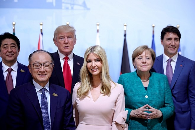 Merklova na G20: Tržišča morajo ostati odprta