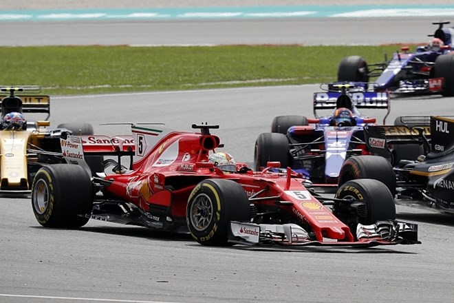 Sebastian Vettel je bil dirkač dirke, hkrati pa je postavil najboljši krog dirkališča, ki se poslavlja od karavane. (Foto:...