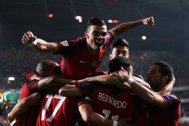 Portugalci so si na zadnji tekmi proti Švici priborili prvo mesto v skupini in neposredno uvrstitev na mundial. (Foto:...