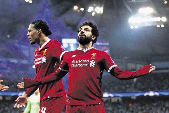 Napadalec Liverpoola Mohamed Salah (desno) je sinoči dosegel že osmi gol v letošnji sezoni lige prvakov.