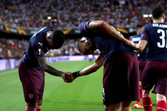 Da v Valencii ni bilo preobrata, sta poskrbela Arsenalova napadalca Pierre-Emerick Aubameyang (desno) in Alexandre Lacazette...