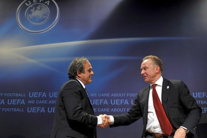 Predsednik Evropskega združenja klubov (Eca) Karl-Heinz Rummenigge in predsednik Uefe Michel Platini.