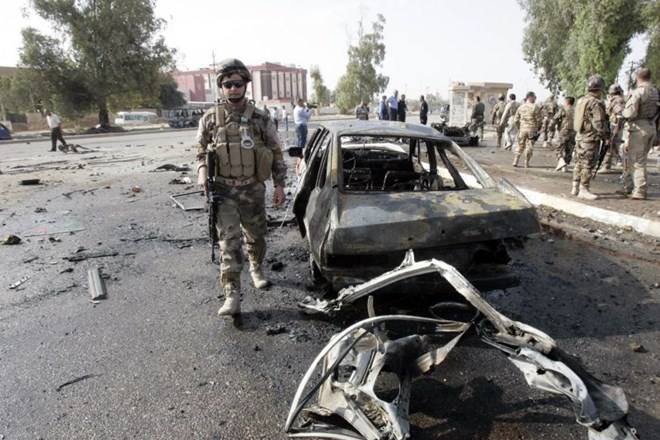 V vrsti bombnih napadov v Iraku številni mrtvi