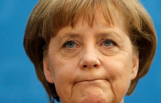 Angela Merkel je priznala, da je bil poraz na volitvah boleč.