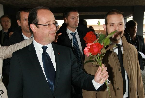 Hollande z rdečimi vrtnicami.