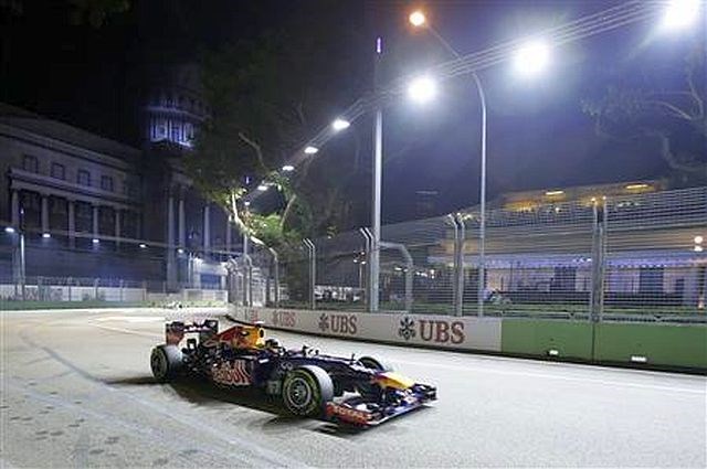 Dirko v Singapurju je dobil dirkač Red Bulla Sebastian Vettel.