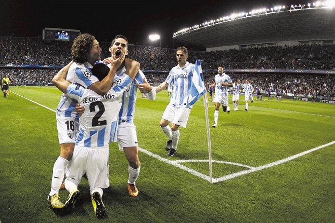Nogometaši Malage so se takole veselili uvrstitve v četrtfinale lige prvakov. 