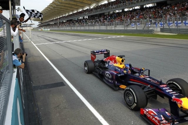 Sebastian Vettel je prvi prečkal ciljno črto v Sepangu. (Foto: Reuters) 