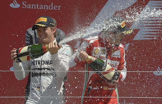 Nico Rosberg je zmagal na dirki v Silverstonu, Fernando Alonso pa je končal na tretjem mestu. (Foto: Reuters) 