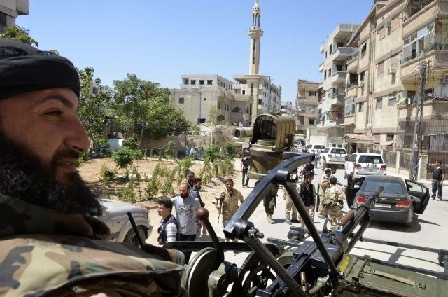 Sirski premier: Sirija bo v primeru tuje vojaške intervencije postala pokopališče za napadalce  