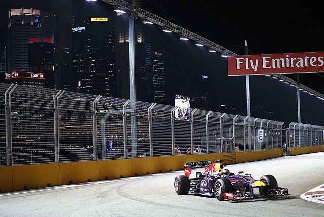 Sebastian Vettel je bil razred zase tudi na ulični dirki v Singapurju. (Foto: Reuters) 