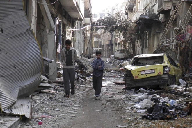 Tudi dogovor, da bodo civilisti smeli zapustiti oblegani Homs, zaenkrat ni uresničen. (Foto: Reuters) 
