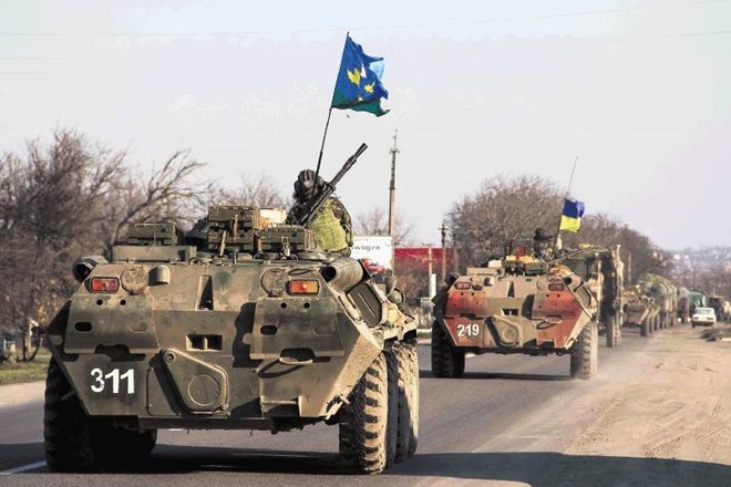 Premiki ukrajinske vojske, kakršen je bil  pri Pervomajsku (na fotografiji), na pol poti med Kijevom in Krimom, so po...