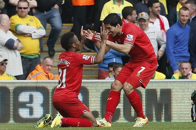 Raheem Sterling z dvema in Luis Suarez z enim golom sta prinesla Liverpoolu zmago v Norwichu. (Foto: Reuters) 