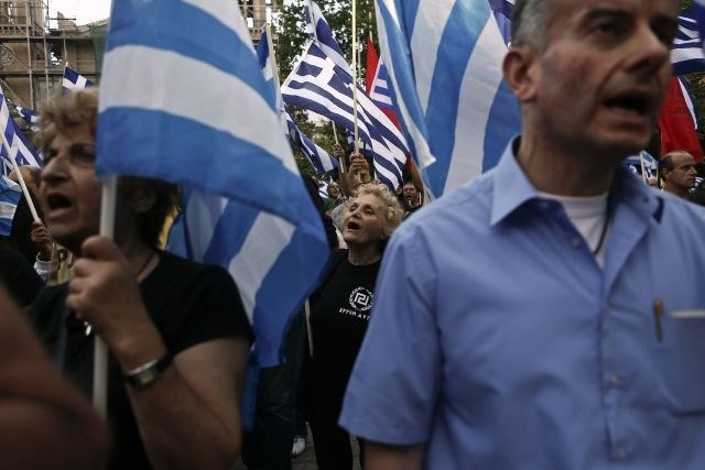 IMF odmrznil 3,4 milijarde evrov pomoči Grčiji