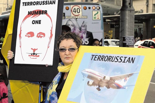 Odgovornost Putina za sestrelitev malezijskega letala je bila nedvoumna tudi za protestnike v Sydneyju, Avstralija pa je...