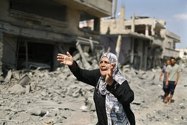 Na območju Gaze začela veljati 12-urna humanitarna prekinitev spopadov; mrtvih že skoraj tisoč Palestincev 