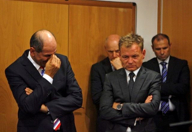 Predsednik SDS Janez Janša z odvetnikom Francijem Matozom.  (foto: Bojan Velikonja) 