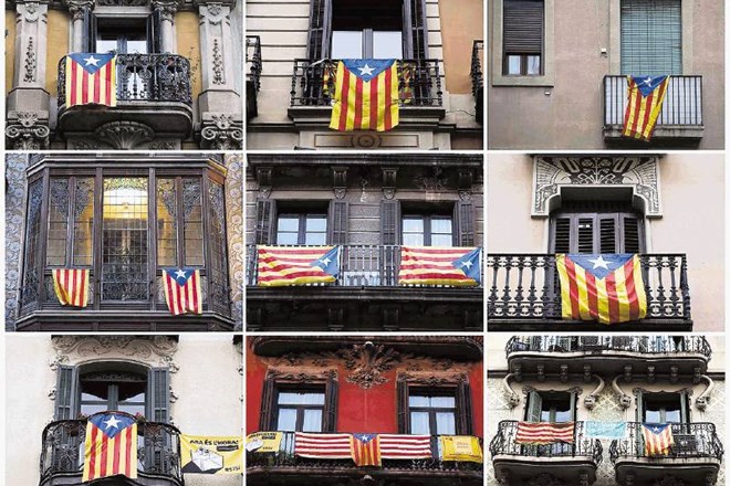 S katalonskih balkonov visijo zastave, s katerimi prebivalci izražajo naklonjenost samostojnosti regije. Reuters 