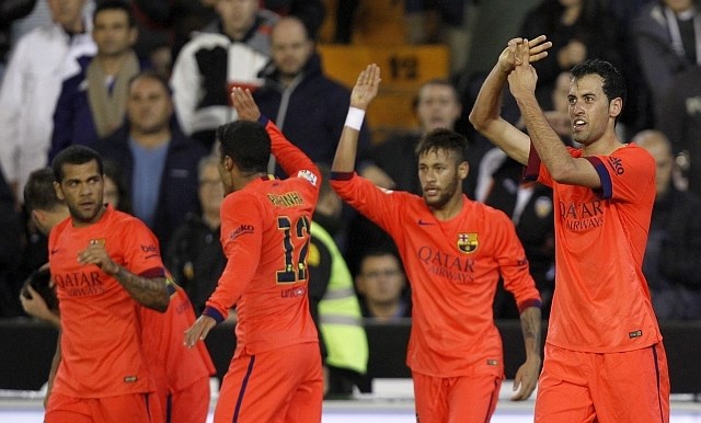 Junak včerajšnje zmage Barcelone je bil Sergio Busquets (desno), ki je zadel v 94. minuti. (Foto: AP) 