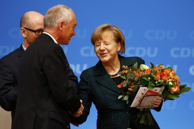 Merklova že osmič zaporedoma izvoljena za predsednico CDU