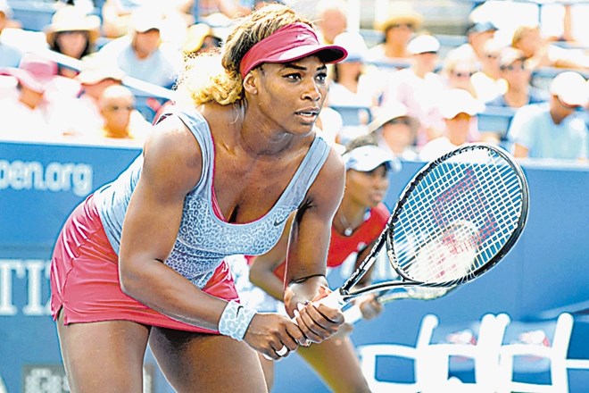 Serena Williams (na fotografiji) je marketinško manj zanimiva od Marie Šarapove, ki na OP ZDA letos ne bo nastopila. 