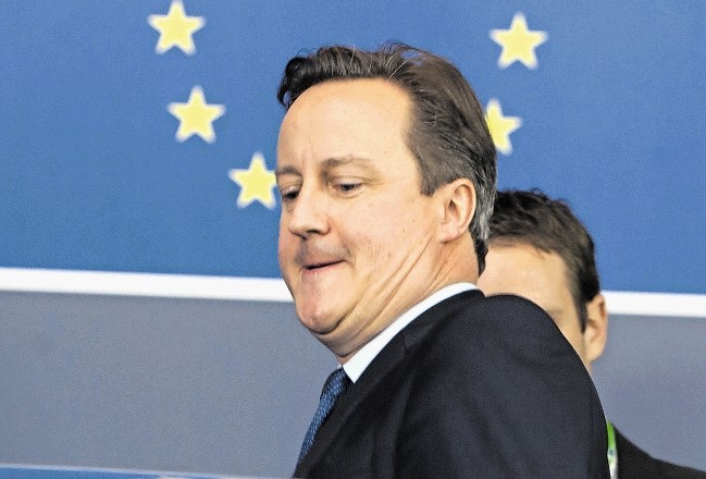 David Cameron je optimist, a doma mu ne verjamejo kaj dosti. 