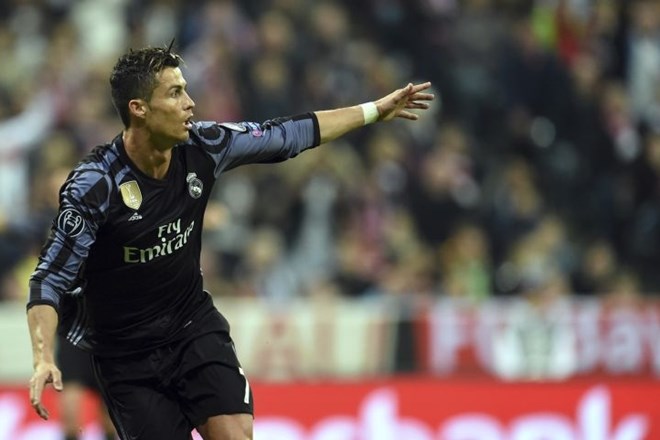 Cristiano Ronaldo proslavlja svoj drugi zadetek proti Bayernu. (Foto: AP)