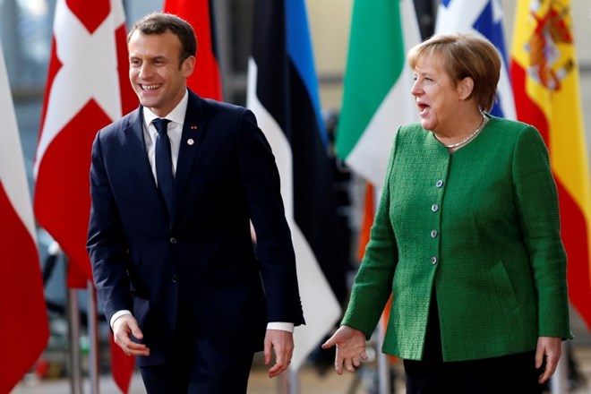Emmanuel Macron in Angela Merkel Reuters