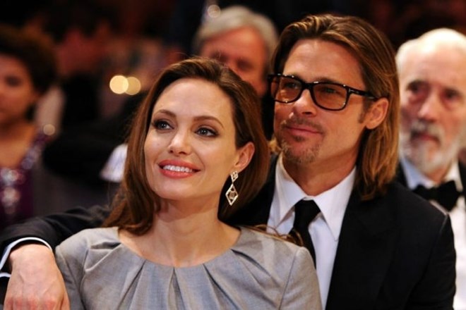 Angelina Jolie in Brad Pitt sta bila par več kot deset let, dve leti od tega še mož in žena.