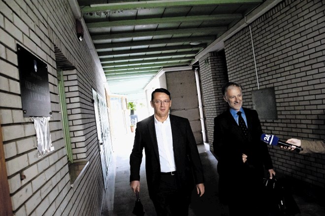 Anton Rop in Emil Zakonjšek ob prihodu na eno od obravnav na prvem sojenju leta 2013.